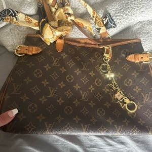 Louis Vuitton tote bag- used- good condition. Tillys will come with.